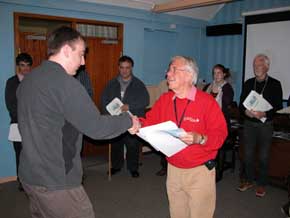 Laurie presenting students with course certificate in 2012