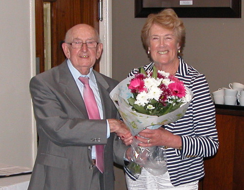 Bernard presented Marion with flowers for her coordination role