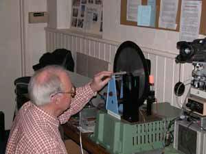 Peter Smith adjusting his replica TV